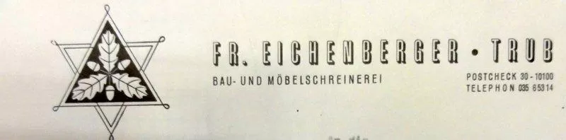 Historisches Logo der Schreinerei Fr. Eichenberger in Trub. Links ein grafisches Emblem mit Eichenblättern und Eichel in einem sechszackigen Stern, rechts der Schriftzug „FR. EICHENBERGER · TRUB – Bau- und Möbelschreinerei“ sowie Kontaktangaben.